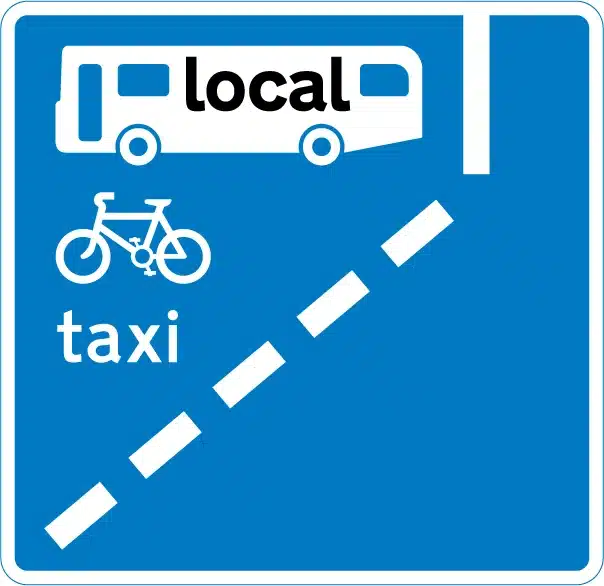 Image shows blue sign with bus taxi and cycle lane