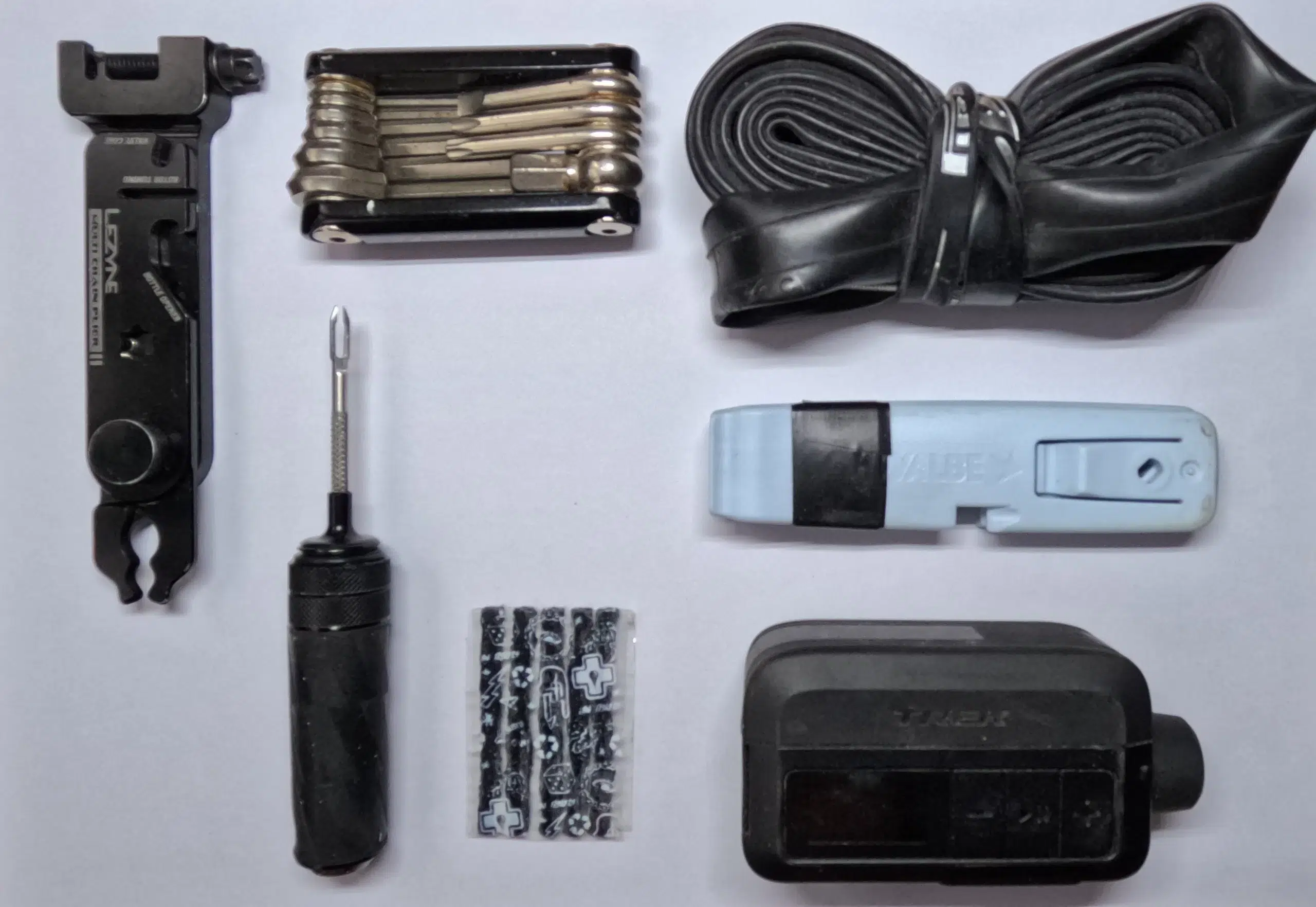 Bicycle repair tools and accessories for a cyclist commuter.